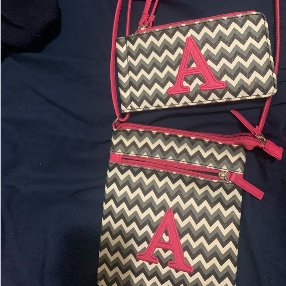 I’m selling a pink white and grey purse